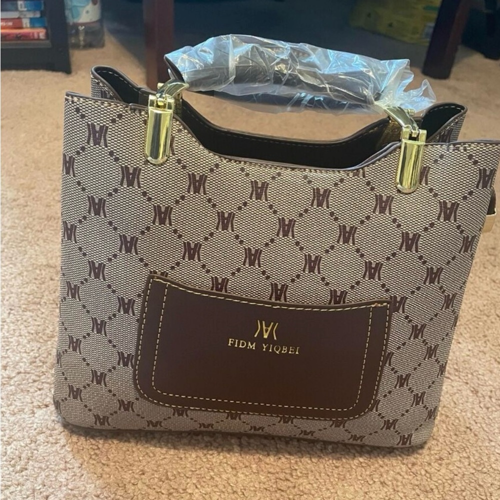 Brown Tote Bag with Monogram Pattern and Gold Hardware